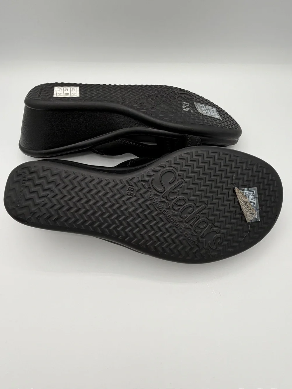 Skechers Black Women's Slip-On Wedge Sandals with Crisscross Straps